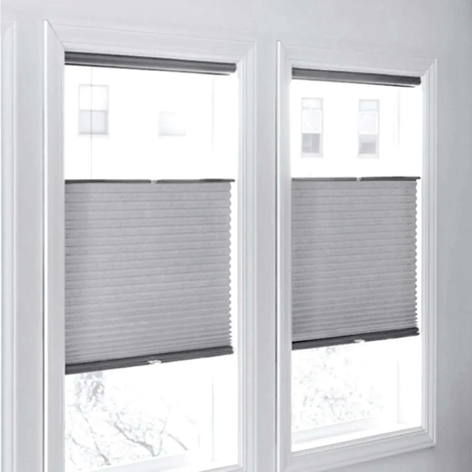 Value Blinds™ Premium cordless light filtering honeycomb shades in a modern interior setting.