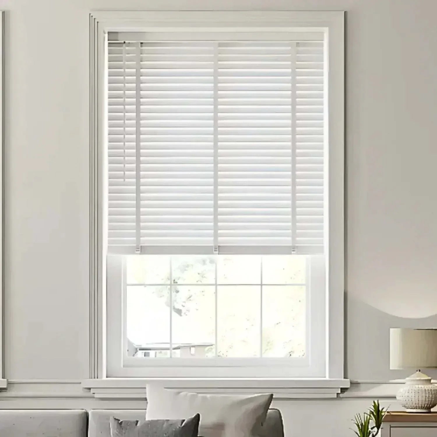 Value Blinds™ motorized basswood blinds with remote control in modern living room