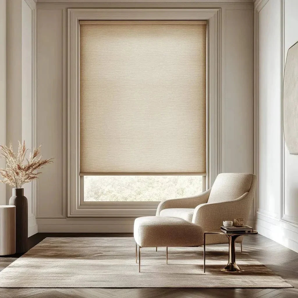 Value Blinds™ elegant motorized light-filtering roller shade in neutral beige in modern living room with armchair and side table