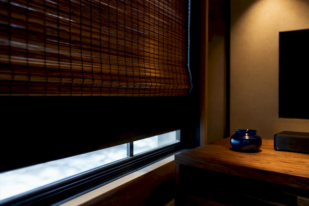 Bamboo shade edge with blackout liner