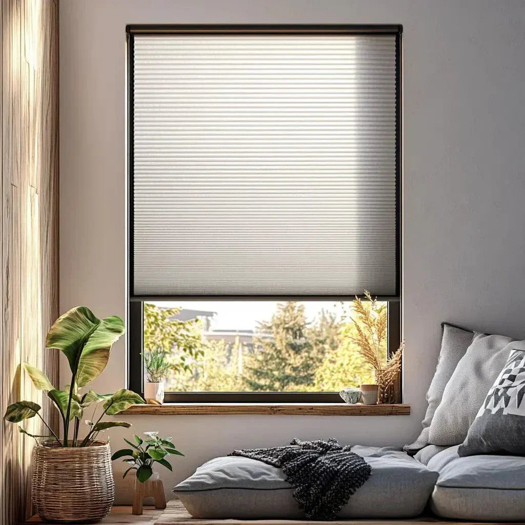 Value Blinds™ Premium honeycomb shades filtering light in living room.